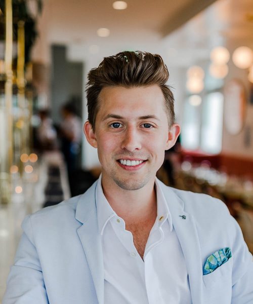 A Man Wearing A Blue Shirt