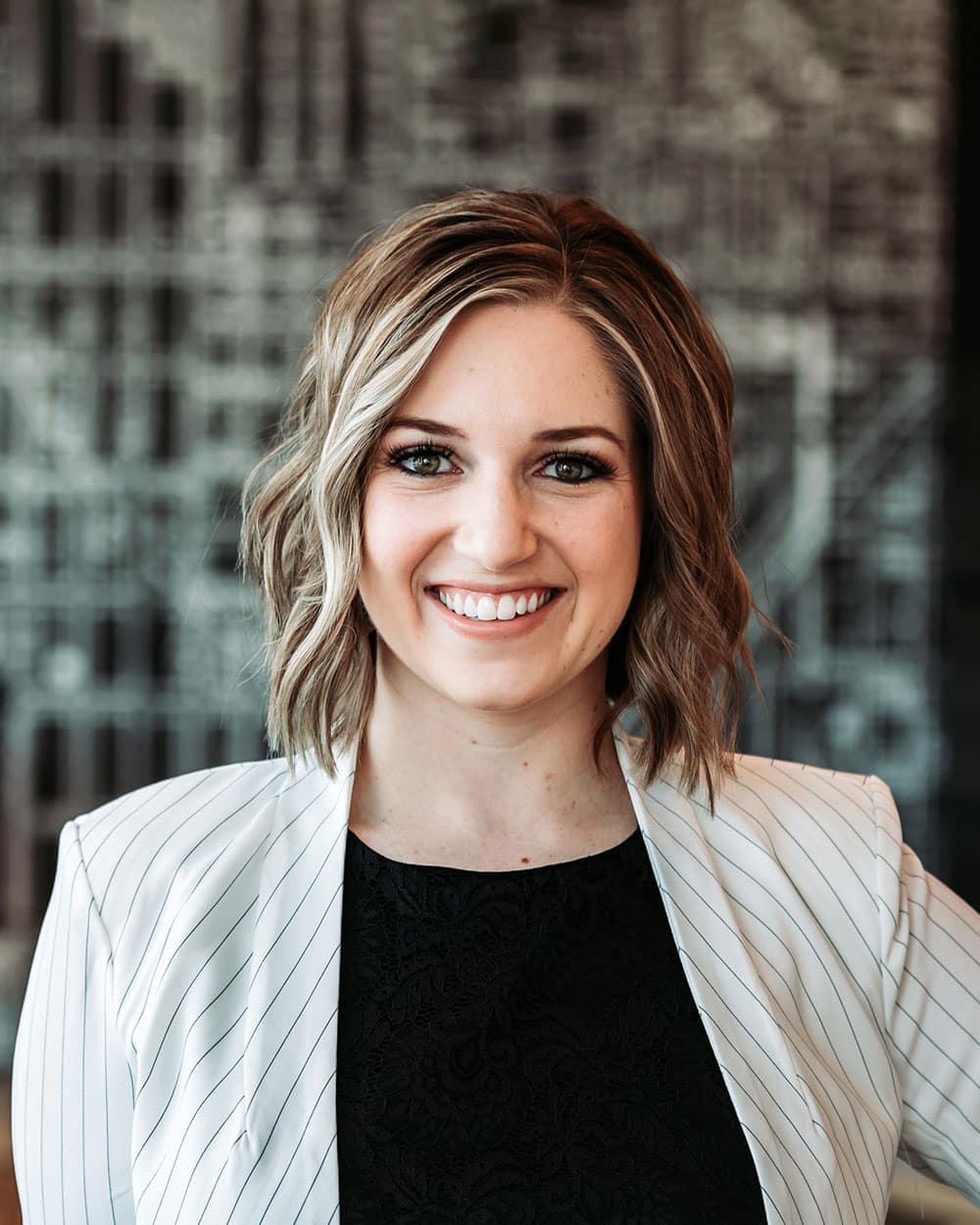 a woman smiling for the camera